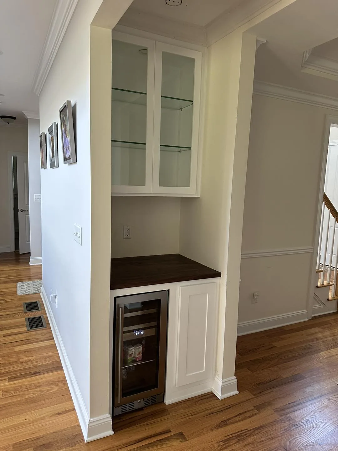 Glass Cabinet & Wine Station — custom carpentry by Custom Interiors & Remodeling