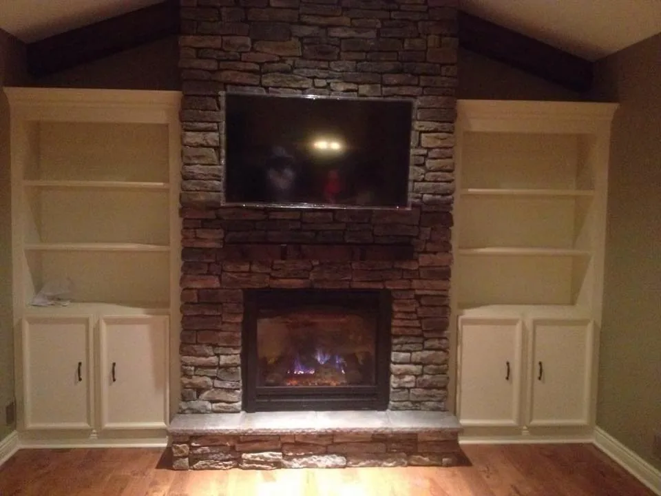 Brick Hearth, Flanking Cabinets — custom carpentry by Custom Interiors & Remodeling