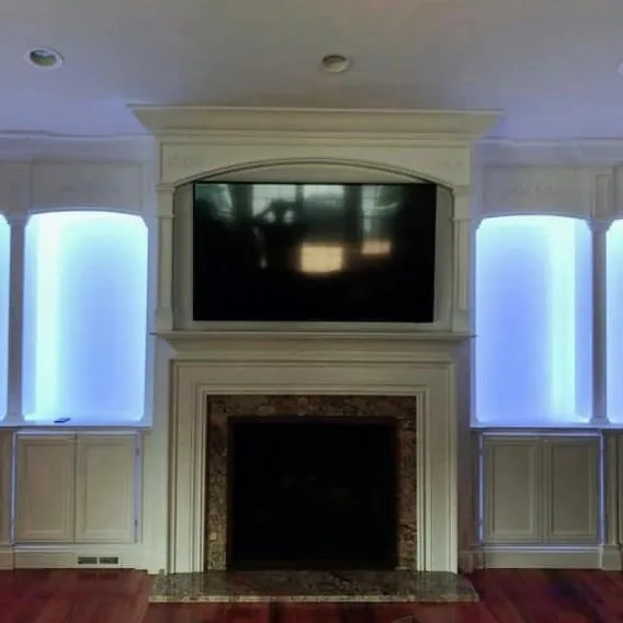 Backlit Mantel & Alcoves — custom carpentry by Custom Interiors & Remodeling